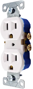 Close-up of a white electric wall outlet with two vertical slots and a round grounding hole. The outlet features metal mounting brackets and screws.