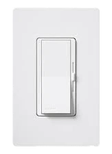 White rectangular light switch mounted on a white wall plate. The switch is in the center, slightly protruded, and has a modern, sleek design.